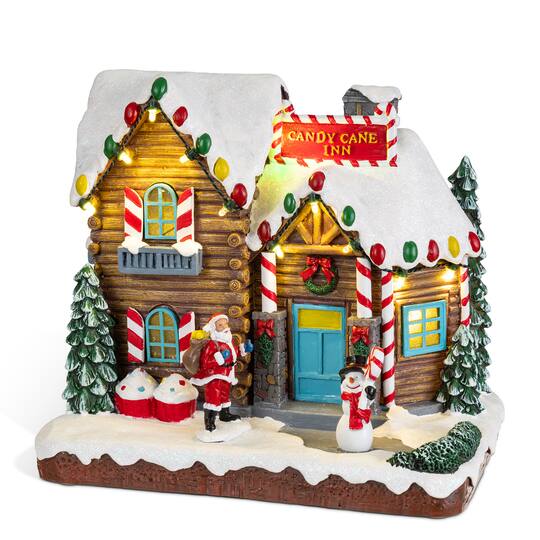 Glitzhome® 9" Lighted Christmas Candy Cane Inn Musical Resin Village with Timer